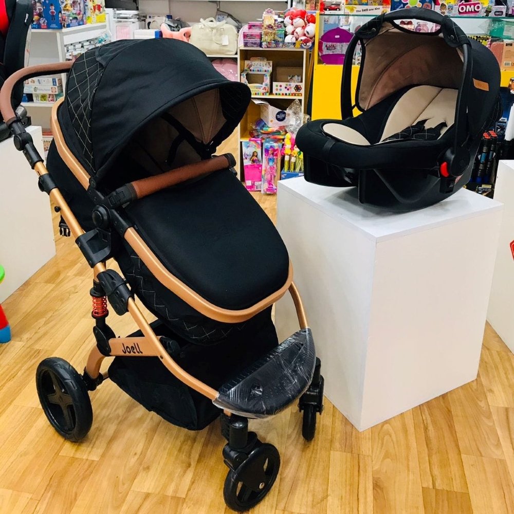 Poussette avec maxicosy noir gold Joell