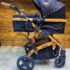 Poussette avec maxicosy noir gold Joell